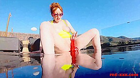 Fucks Her Pussy With A Toy In The Pool With Red Xxx
